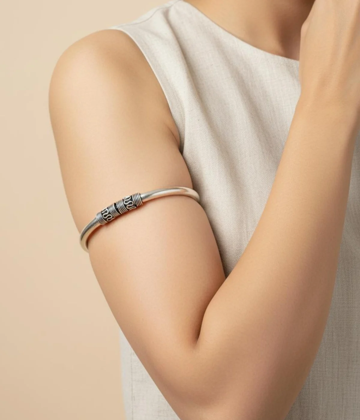 Solid Sterling Silver Lock Bangle with a smooth band. Features decorative, oxidized wirework cylinders at the pin closure. Traditional Tribal Kada for daily wear.