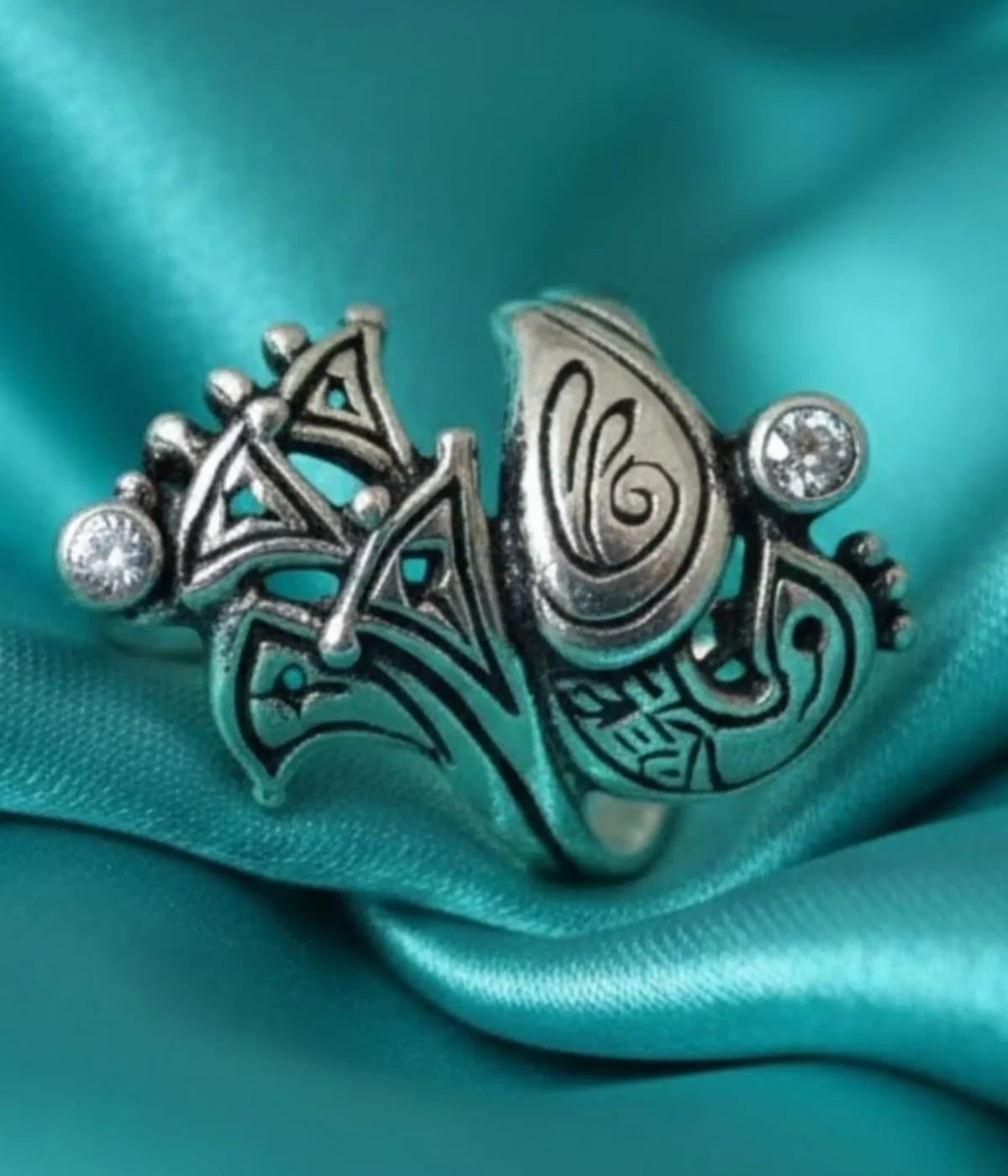 Oxidized Sterling Silver Peacock Ring. Detailed Mayur motif in an ethnic, antique tribal look design with small CZ accents. Traditional statement ring.