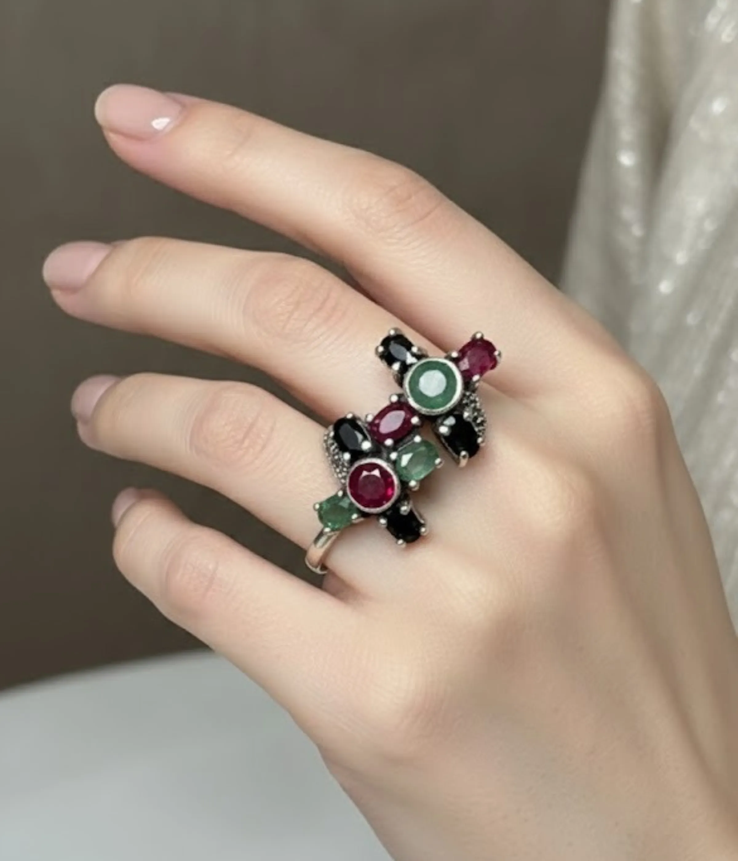 Oxidized Sterling Silver Multi-Gemstone Statement Ring. Features a Tri-Color cluster of Ruby, Emerald, and Black Onyx stones in a vintage-style criss-cross design. Cocktail Ring jewelry.