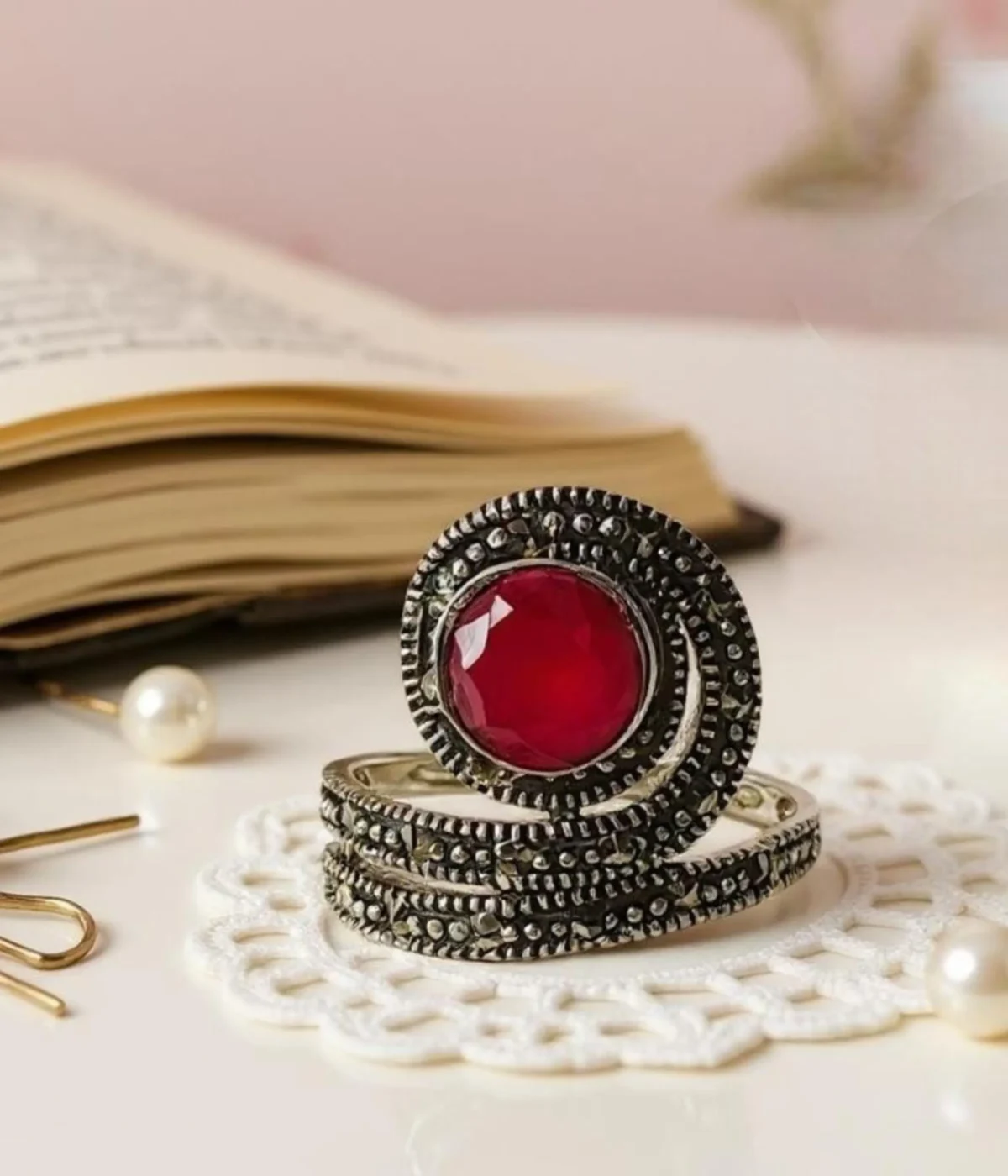Vintage Marcasite Coil Ring. Oxidized Sterling Silver wrap ring featuring a large faceted Ruby Red center stone and detailed Marcasite accents. Antique Statement Jewelry.