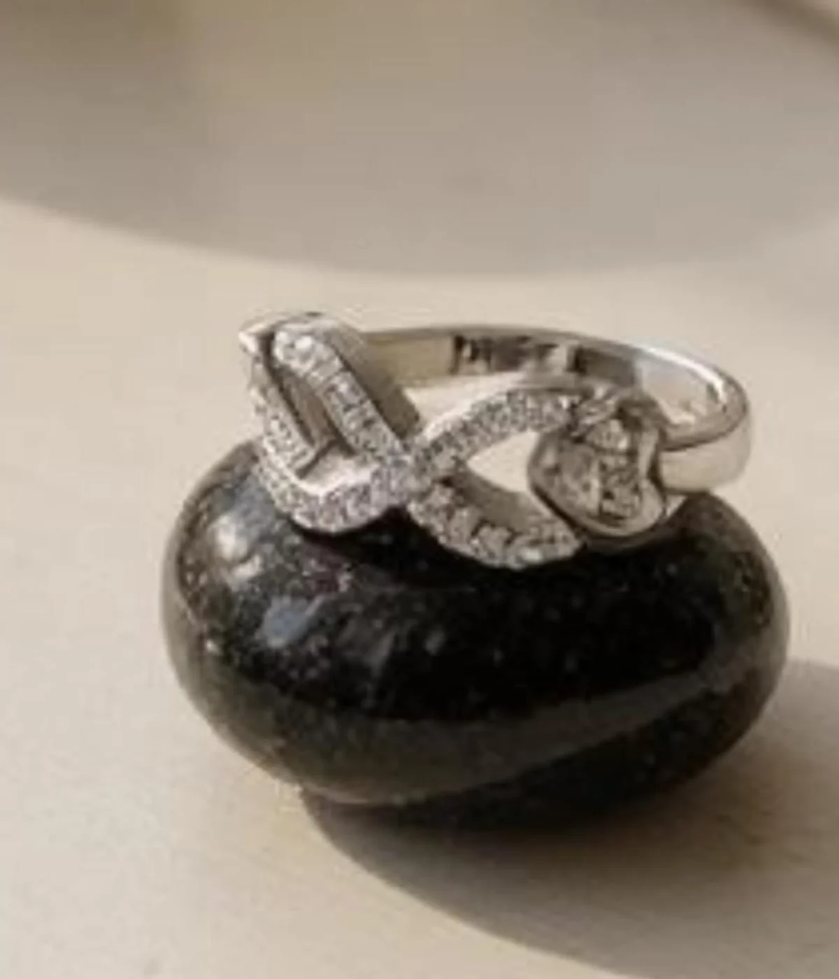 Sterling Silver Infinity Ring. Elegant Pave CZ design forming the forever love symbol (figure-eight). Dainty promise ring or everyday jewelry.