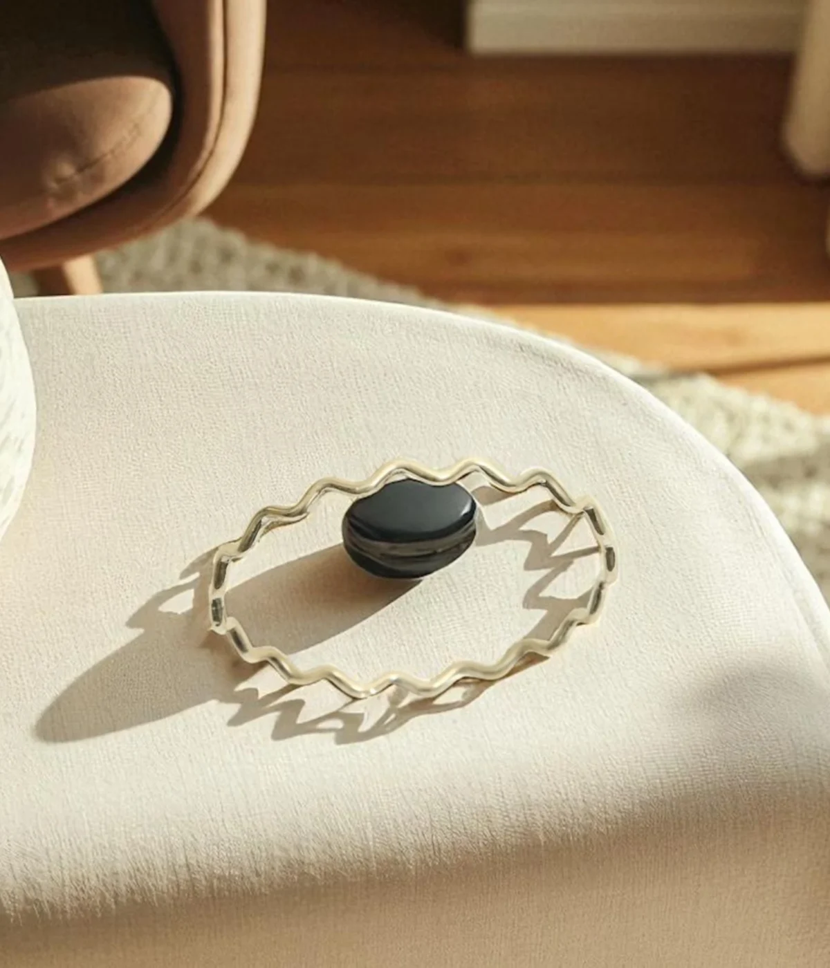 Set of 4 Sterling Silver Wave Stacking Bangles featuring a minimalist ripple texture. Dainty 925 silver layering jewelry and a unique everyday gift for women.