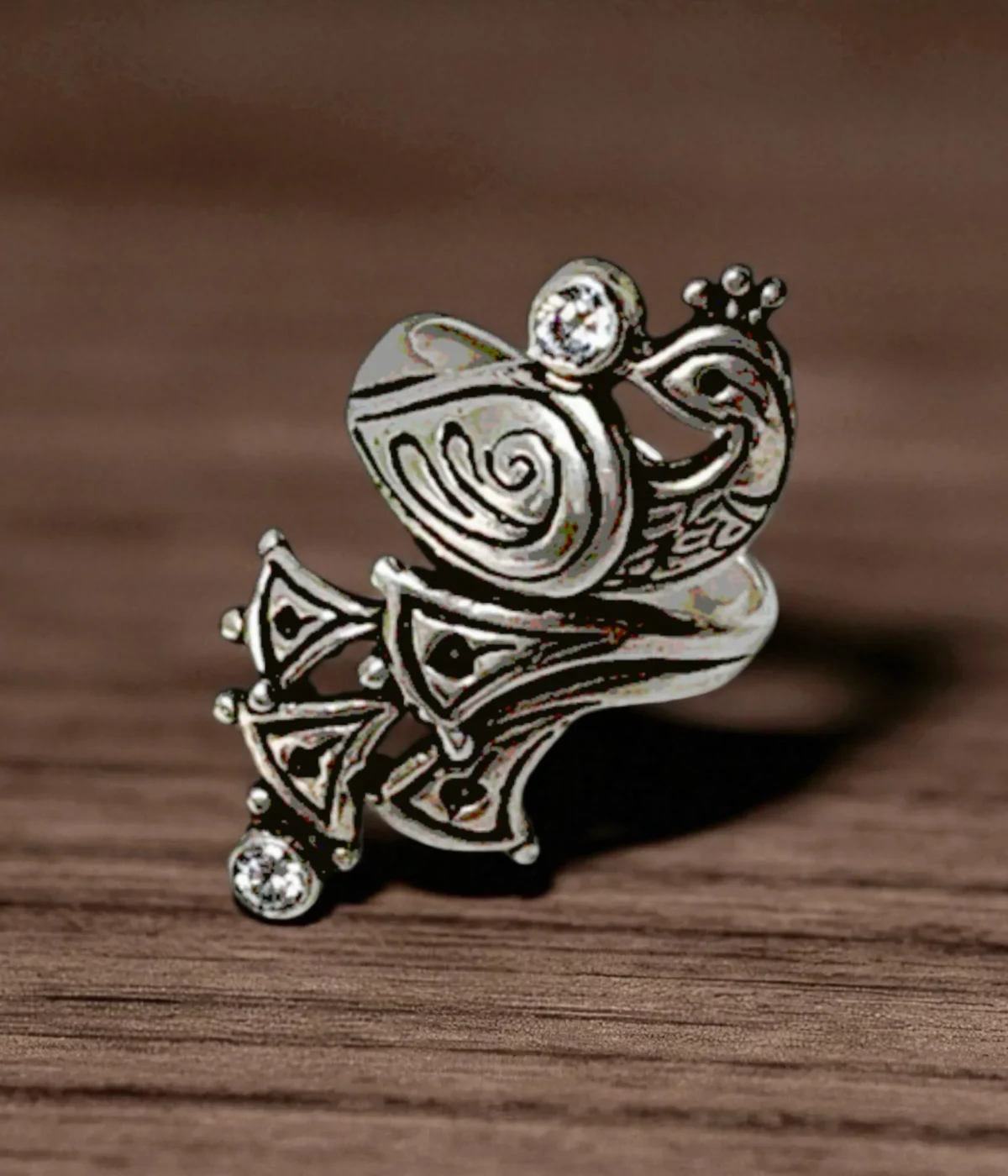 Oxidized Sterling Silver Peacock Ring. Detailed Mayur motif in an ethnic, antique tribal look design with small CZ accents. Traditional statement ring.