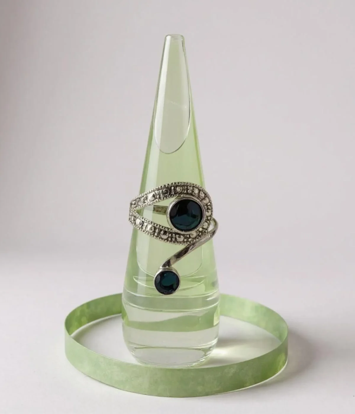 Vintage Style Blue Sapphire Bypass Ring. Sterling Silver two-stone design featuring a large oval and small round Sapphire Blue stone, accented with milgrain and clear pave details. Art Deco Statement Jewelry.