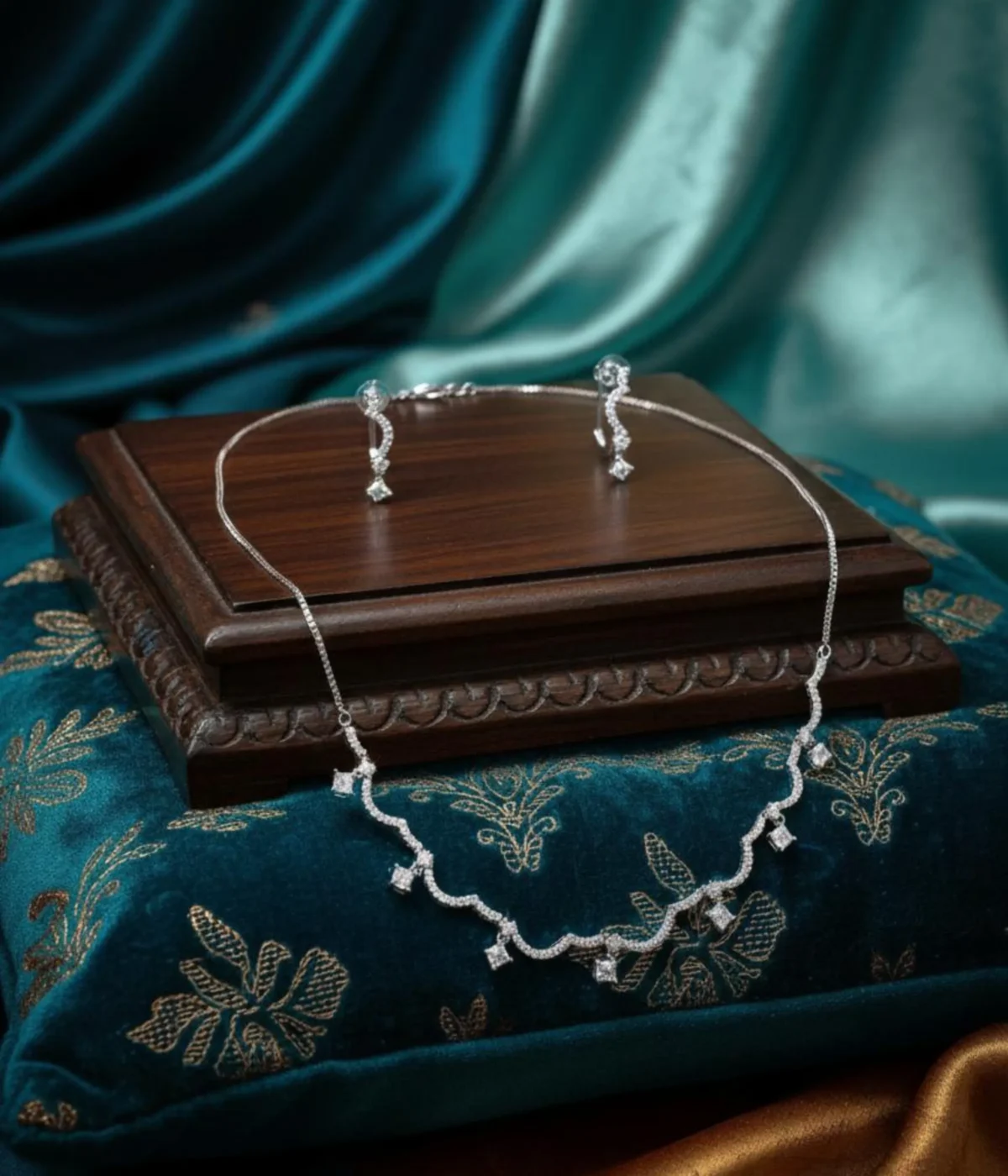 Elegant Zircon Wave Necklace and Earring Set. The necklace features a curved, sparkling diamond-style design, paired with climber stud earrings.