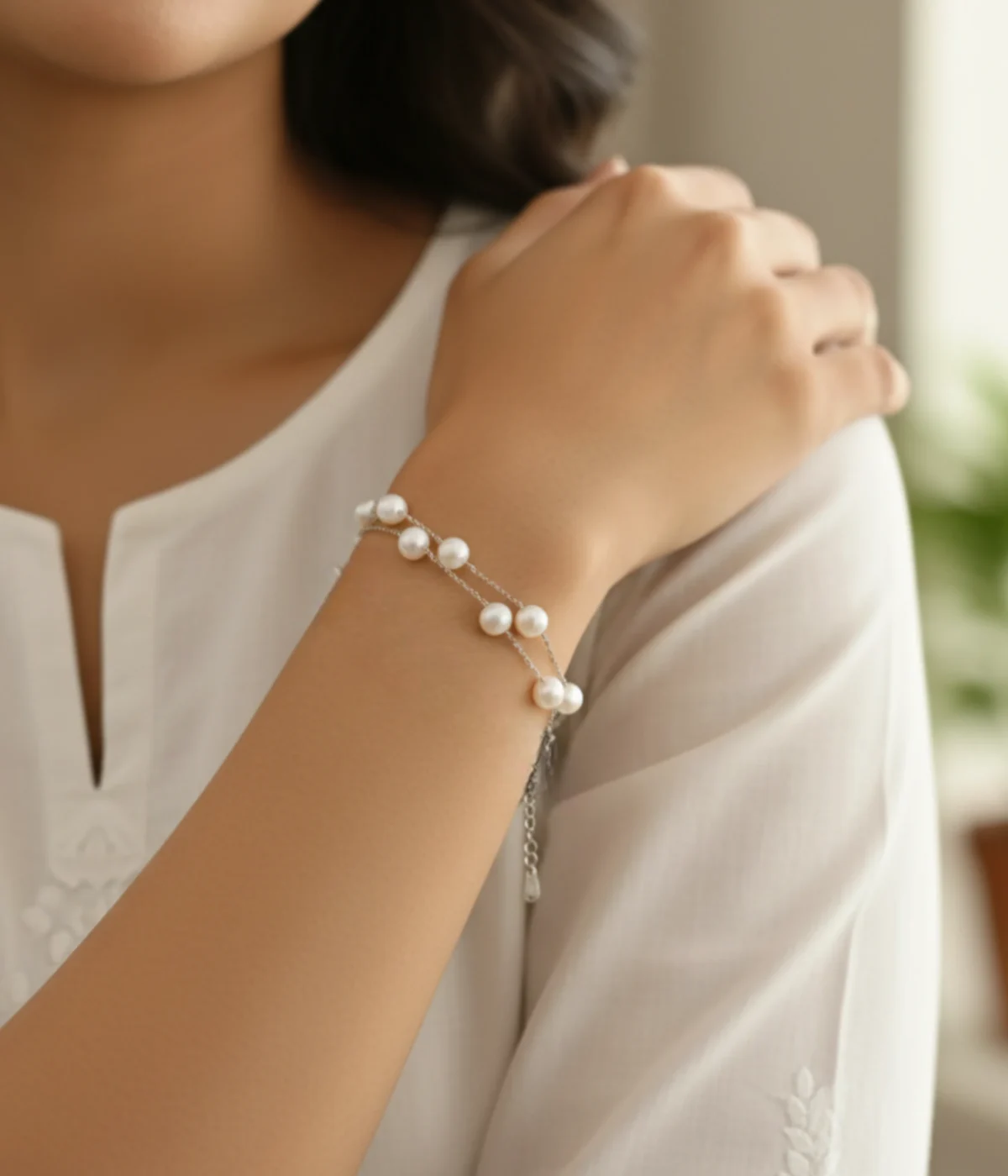 25 Sterling Silver Double-Strand Pearl Bracelet featuring Freshwater Pearls on a minimalist layering chain. Dainty and elegant jewelry gift for women.