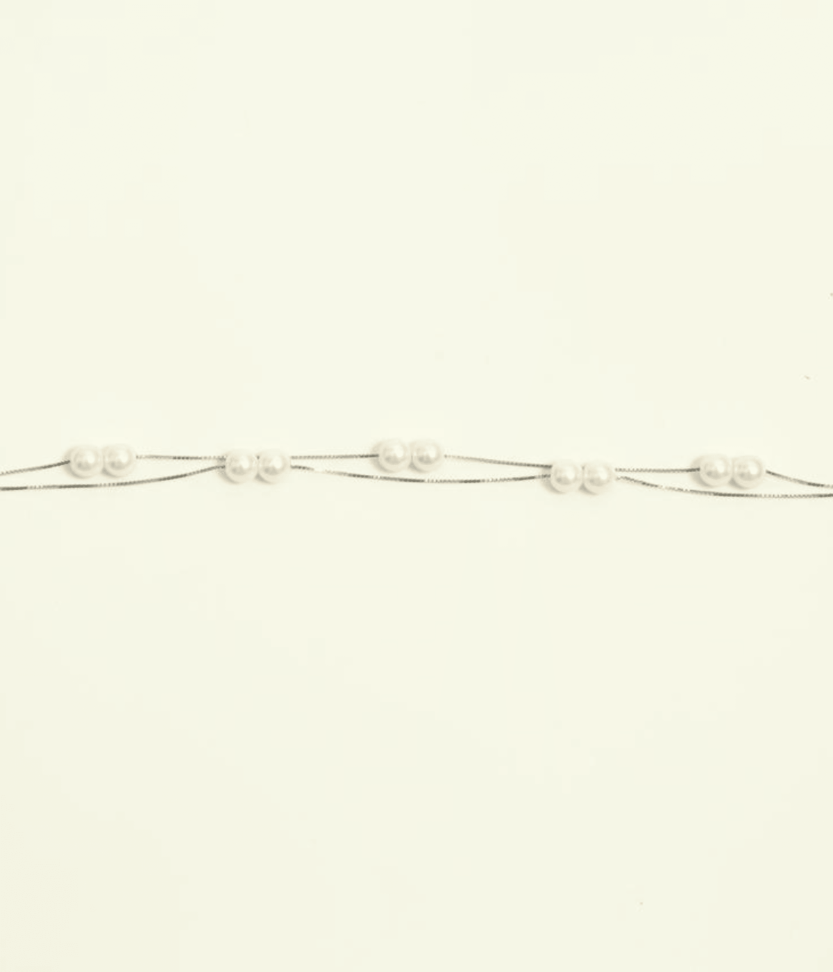 NeerSterling Silver Double Strand Pearl Bracelet with scattered Freshwater Pearls. Dainty layered chain bracelet, ideal for minimalist or bridal jewelry.