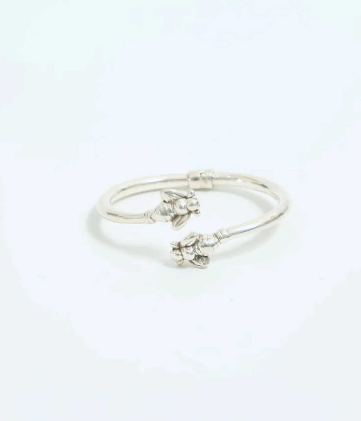 925 Sterling Silver Open Bangle featuring a Dual Bee Motif. Nature-inspired cuff bracelet symbolizing abundance and hard work. Unique boho gift for women.