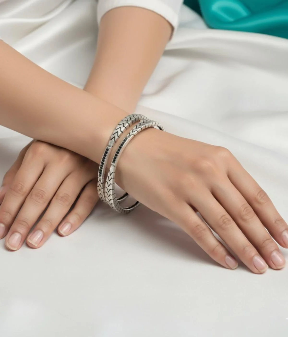 Set of 2 Oxidized Sterling Silver Stackable Bangles featuring a bold geometric chevron pattern and black accents. Vintage tribal jewelry gift in 925 silver.