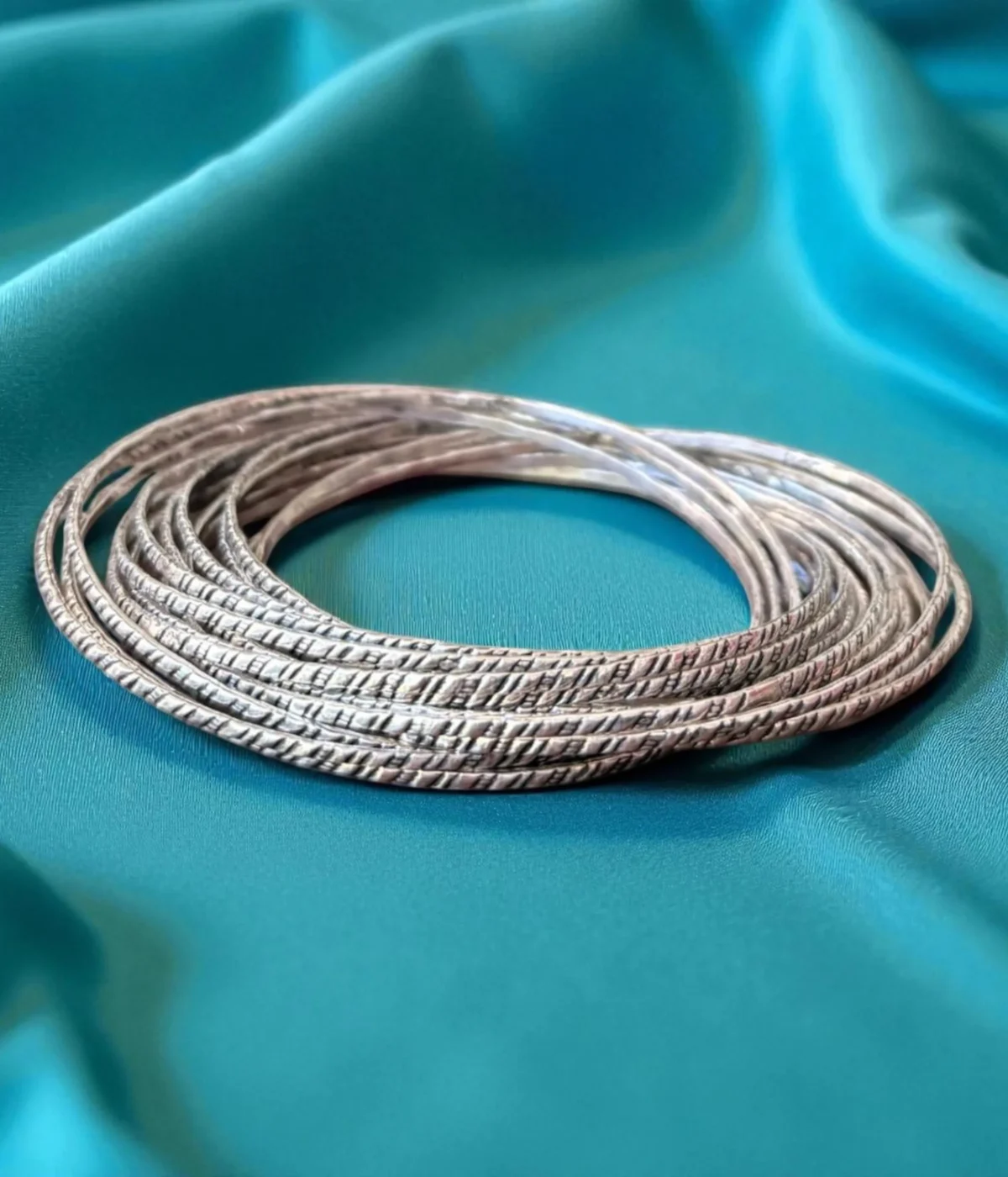 Sterling Silver Intertwined Kada. 925 Oxidized Bangle giving a 16-in-1 stacked look. Unique textured single-piece bracelet; a boho-chic gift for daily wear.