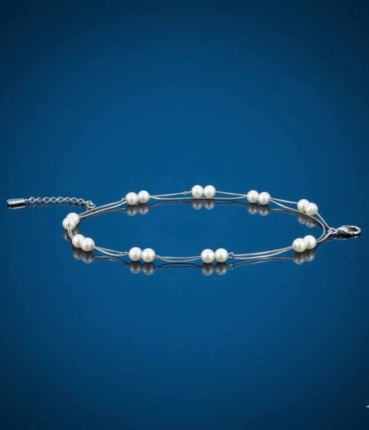 NeerSterling Silver Double Strand Pearl Bracelet with scattered Freshwater Pearls. Dainty layered chain bracelet, ideal for minimalist or bridal jewelry.