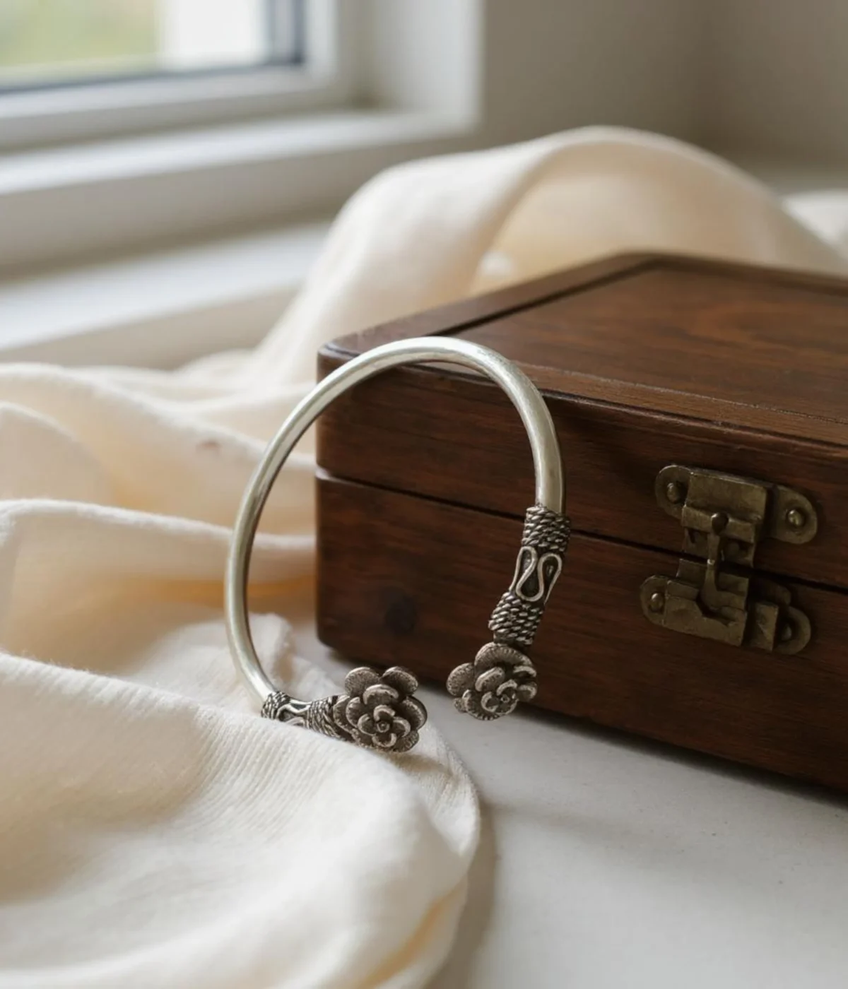 Neersterling Oxidized silver open cuff bangle with detailed floral rose ends.
