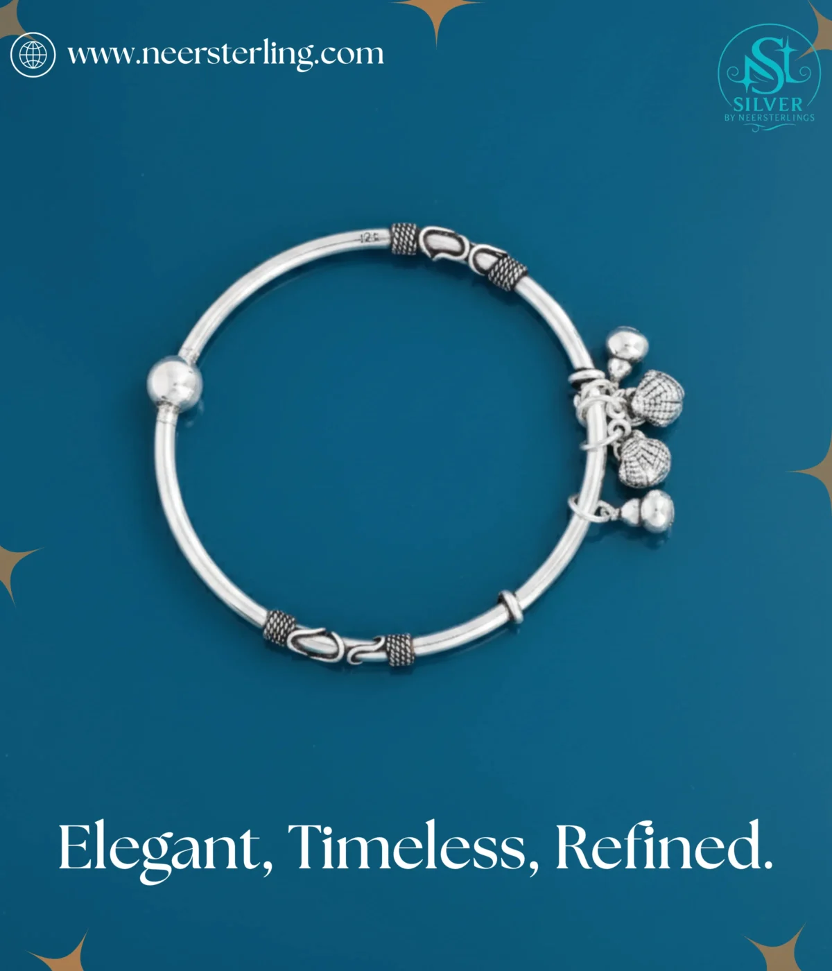 925 Sterling Silver Ghungroo Bangle | Oxidized Tribal Charm Bracelet with jingle bells on a dark blue background.