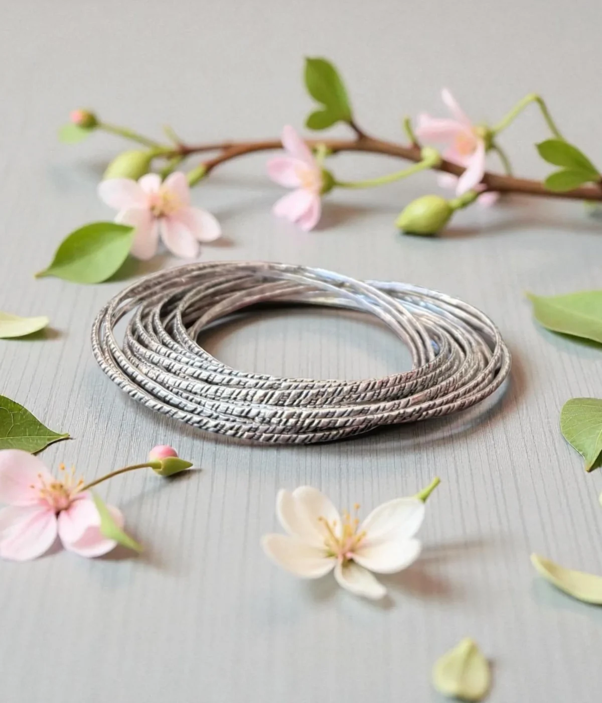 Sterling Silver Intertwined Kada. 925 Oxidized Bangle giving a 16-in-1 stacked look. Unique textured single-piece bracelet; a boho-chic gift for daily wear.