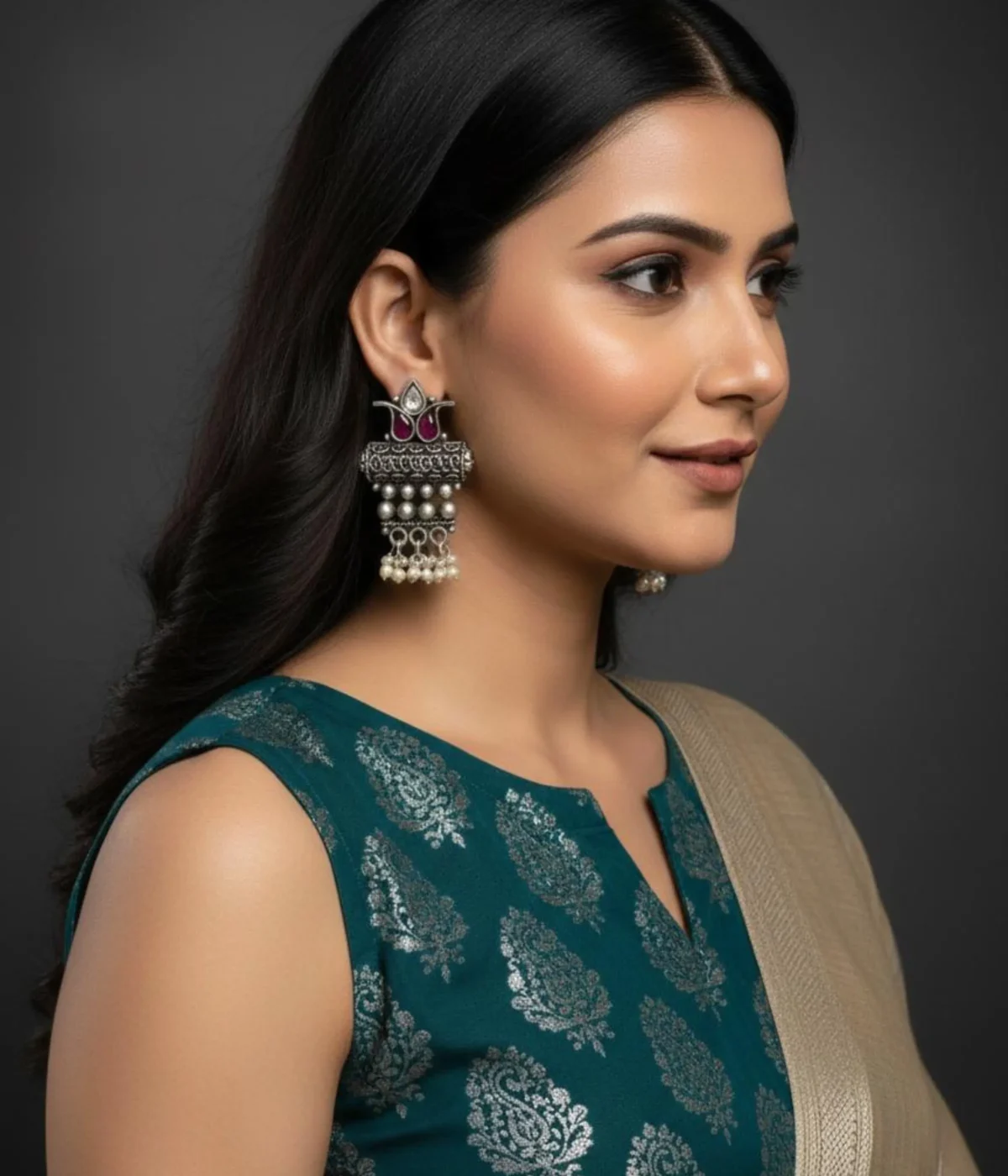 Oxidized Ethnic Pearl Cluster Drop Earrings (7 gm) being worn. The Traditional Indian style features a Maroon Stone center, Floral Motif, and Pearl Dangles. Lightweight Antique Silver jewelry.