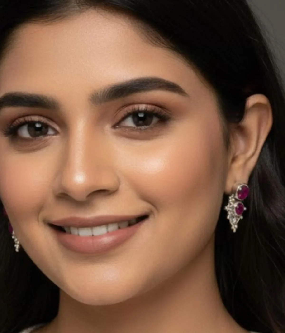 Pair of Oxidized Silver Stud Earrings. Ethnic ruby stone cluster design with intricate detailing, displayed in an open light wood jewelry gift box.