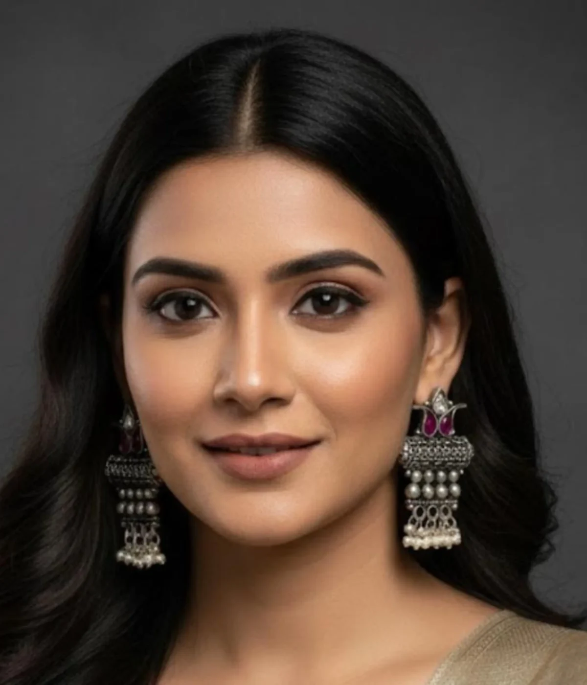 Oxidized Ethnic Pearl Cluster Drop Earrings (7 gm) being worn. The Traditional Indian style features a Maroon Stone center, Floral Motif, and Pearl Dangles. Lightweight Antique Silver jewelry.