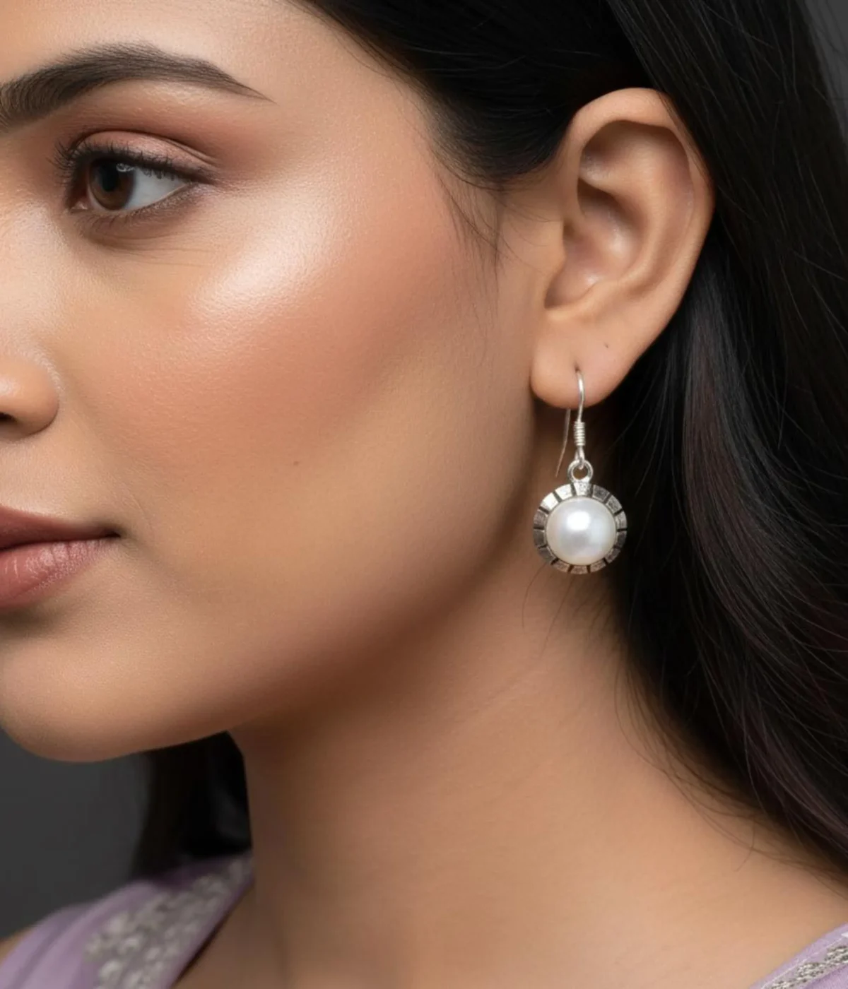 Pair of Vintage Style Pearl Drop Earrings (2.7 gm). Round pearl set in an ornate silver bezel, displayed on a red velvet stand inside a wooden gift box.