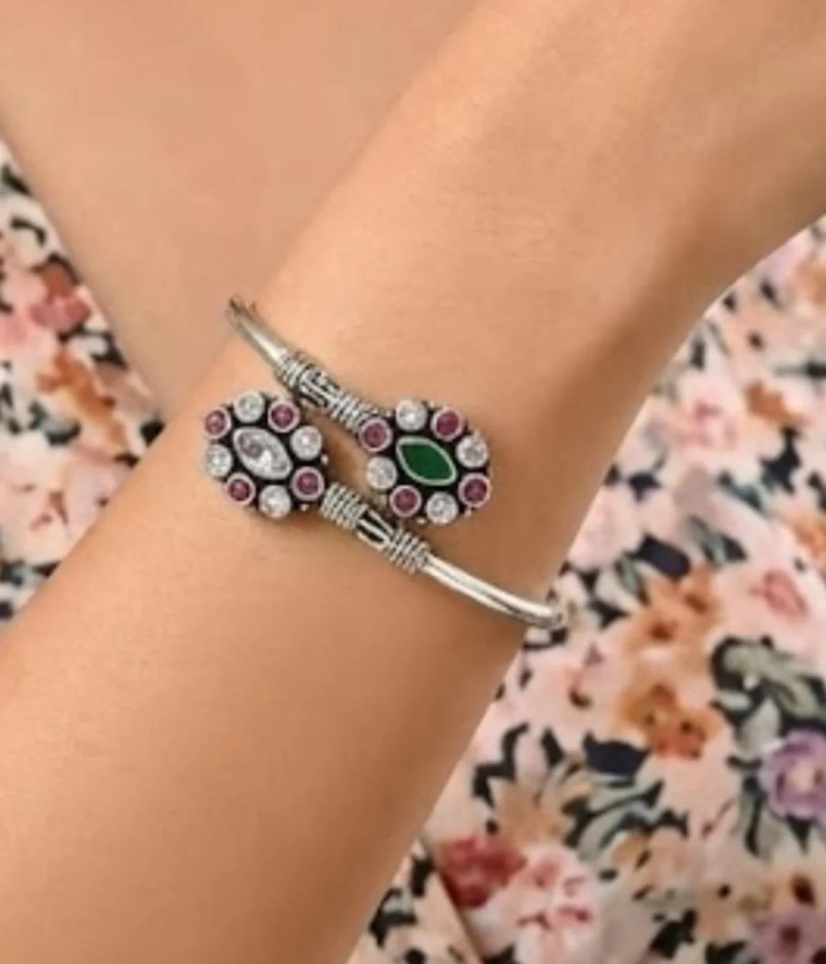 Premium 16.3 gm oxidized silver floral stone bracelet featuring a vibrant emerald green and ruby-maroon dual-flower design on a white background.