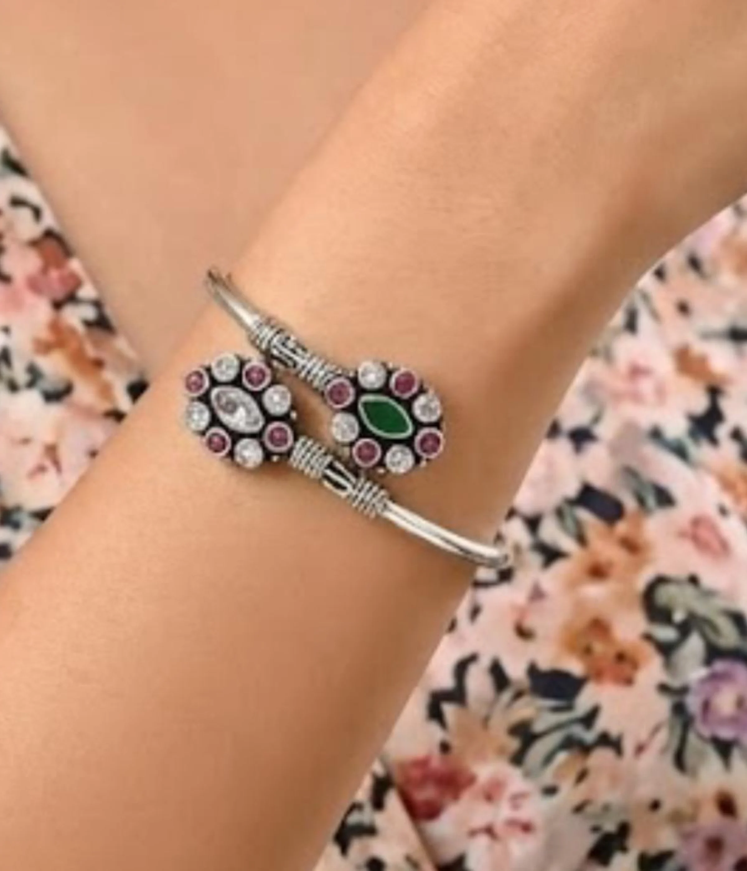Premium 16.3 gm oxidized silver floral stone bracelet featuring a vibrant emerald green and ruby-maroon dual-flower design on a white background.