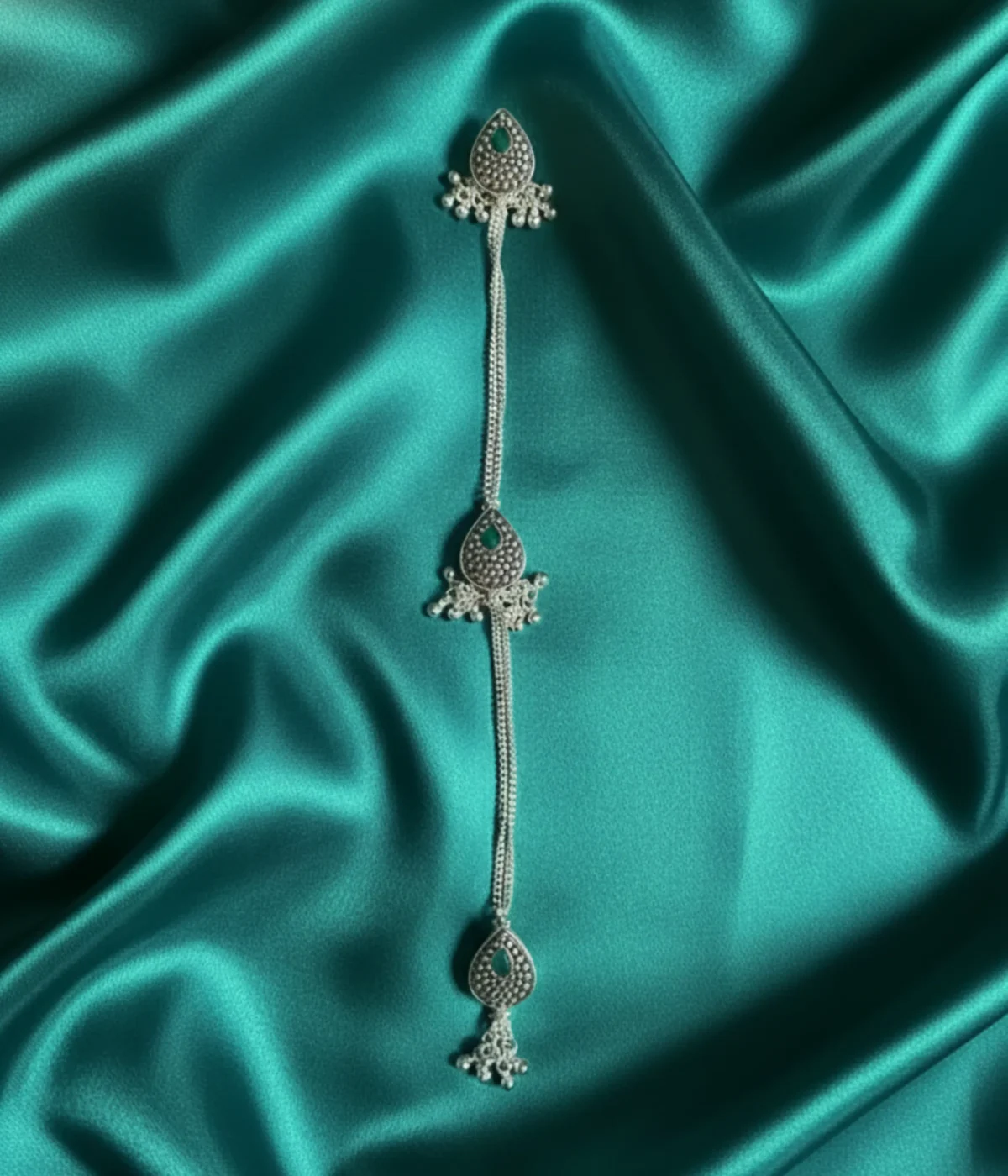 Handcrafted 29.6g sterling silver kurta button chain featuring three antique floral-motif buttons linked in a straight vertical row with a delicate silver chain