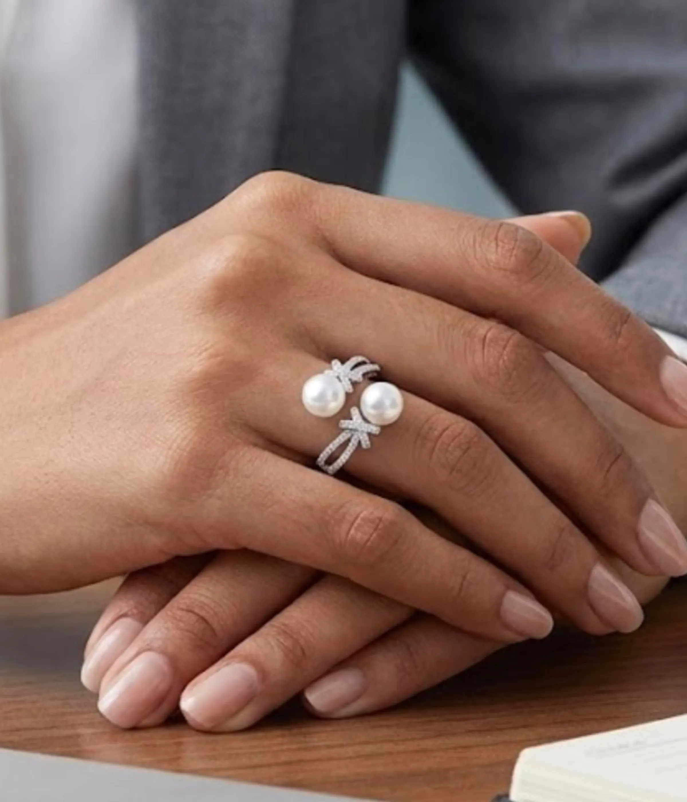 Silver plated open ring with two pearls and zirconia accents on adjustable band