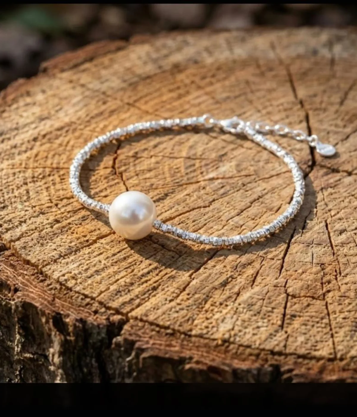 Silver plated beaded bracelet with single freshwater pearl and adjustable chain clasp