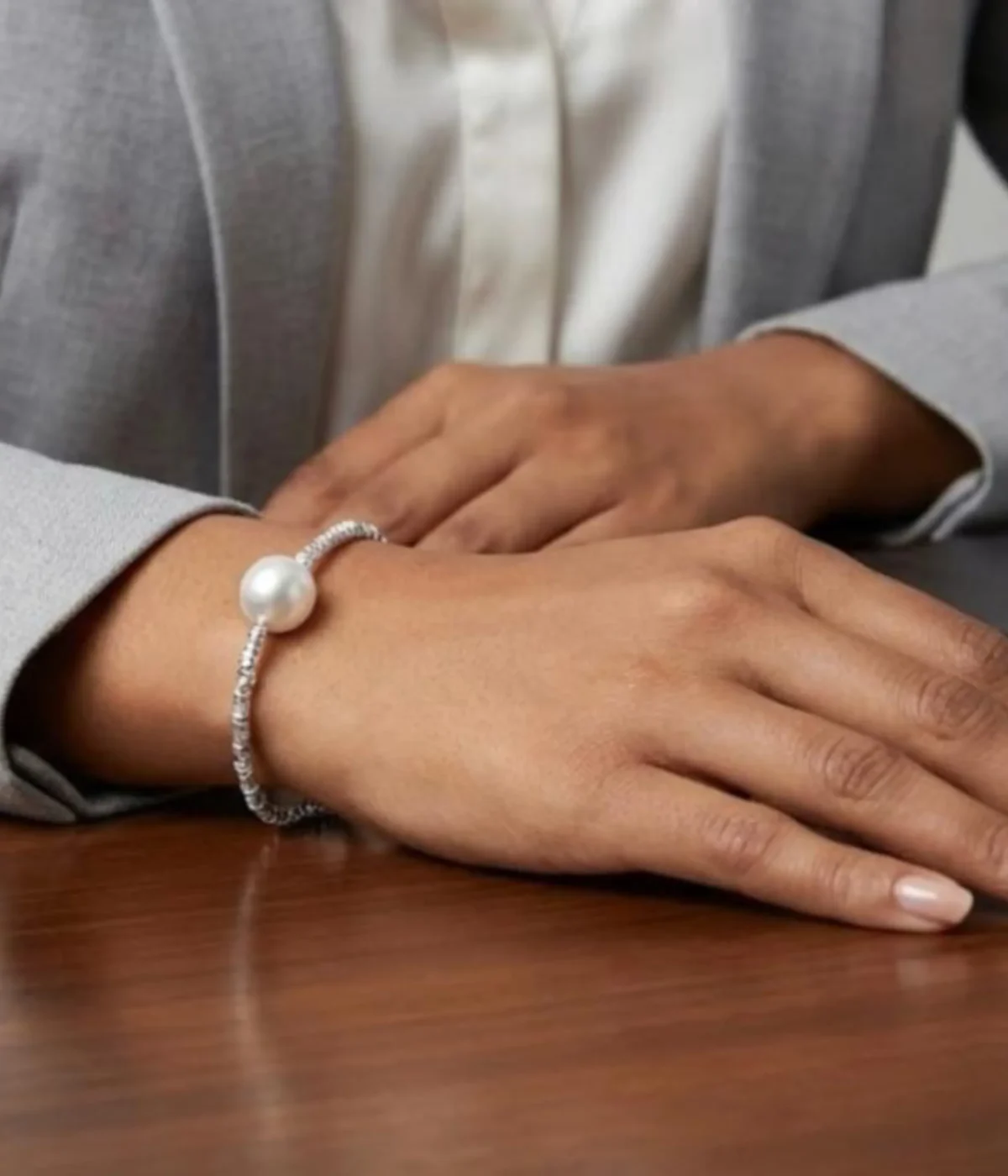 Silver plated beaded bracelet with single freshwater pearl and adjustable chain clasp