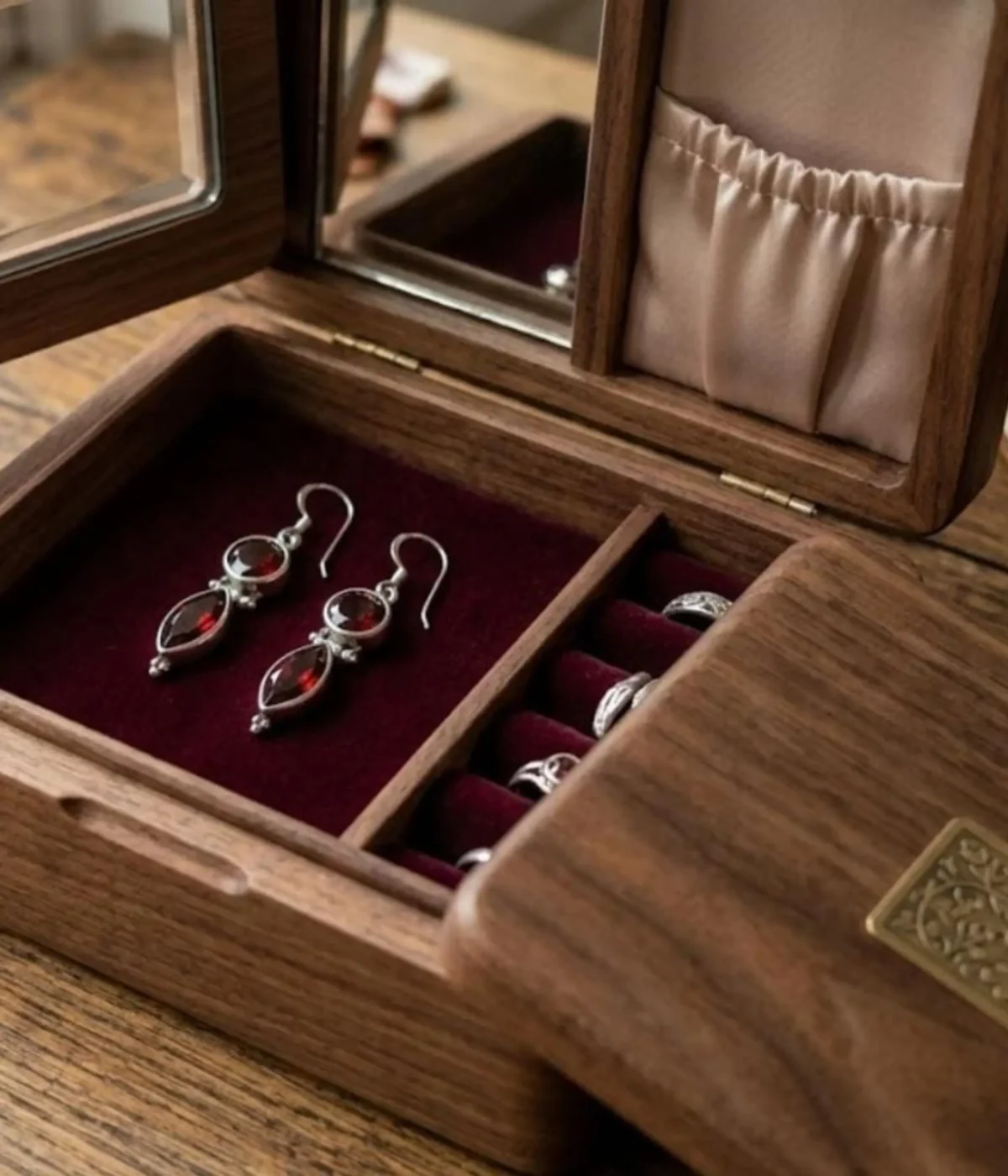 925 sterling silver drop earrings with deep red garnet stones in round and marquise cuts, elegant dangle design for women.