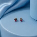 Ruby Floral Stud Earrings A-227 featuring a vibrant ruby center and elegant flower-inspired design